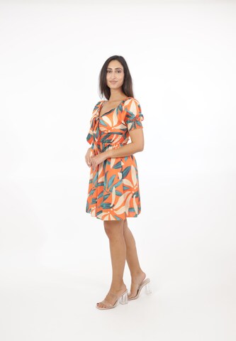 Elara Kjole i orange