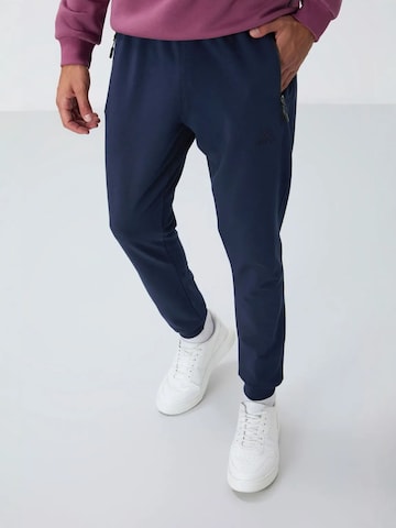 Regular Pantalon de sport Tommy Life en bleu