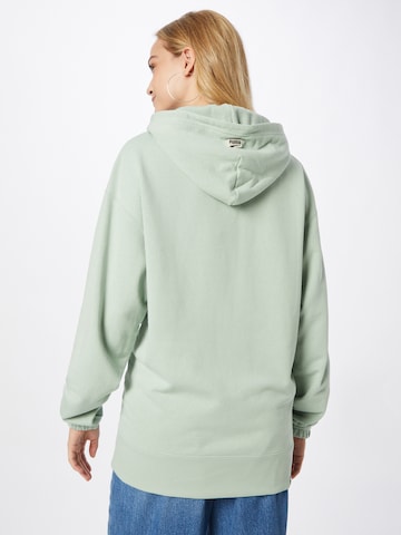PUMA Athletic Sweatshirt 'PUMAxABOUT YOU' in Green