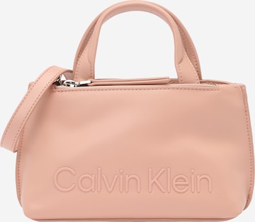 Calvin Klein Τσάντα χειρός σε ροζ: μπροστά