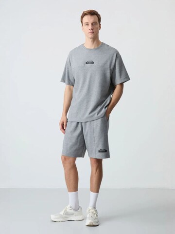 Survêtement Tommy Life en gris : devant