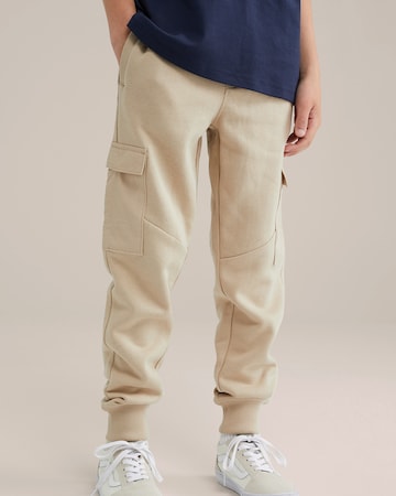 WE Fashion Конический (Tapered) Штаны в Бежевый: спереди