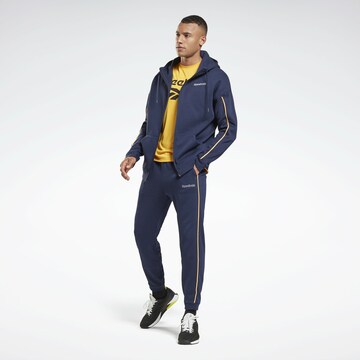 Reebok Tapered Sporhose in Blau