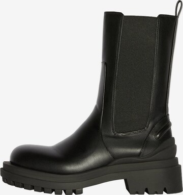 Bershka Chelsea boots in Zwart