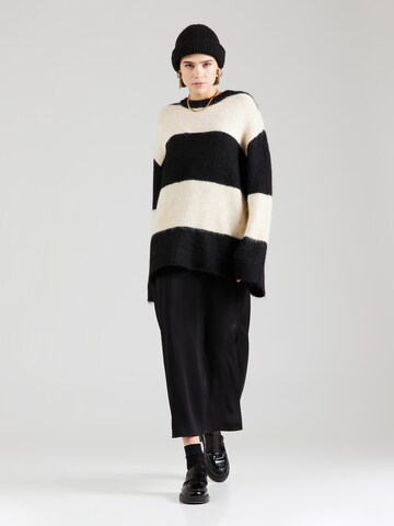 NA-KD Sweter oversize w kolorze beżowy