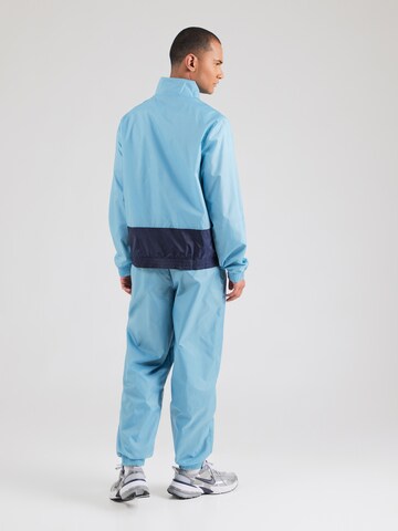Nike Sportswear Joggingpak 'CLUB' in Blauw