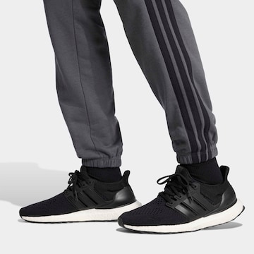 ADIDAS SPORTSWEAR Tapered Workout Pants 'Essentials' in Grey