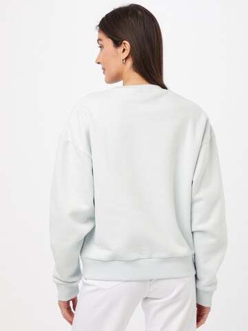 Comfort Studio by Catwalk Junkie Sweatshirt 'BE GOOD DO GOOD' in Blau