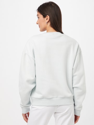 Comfort Studio by Catwalk Junkie Sweatshirt 'BE GOOD DO GOOD' i blå