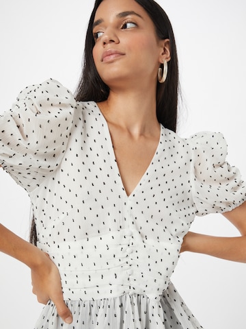 River Island - Blusa en blanco