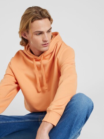 HUGO - Sweatshirt 'Dapo' em laranja