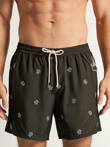 IUMAN Intimissimi Swim Trunks in Green: front