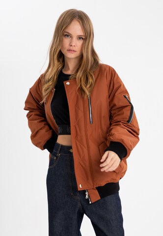 ET Nos Between-Season Jacket in Orange: front