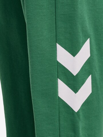 Tapered Pantaloni sportivi di Hummel in verde