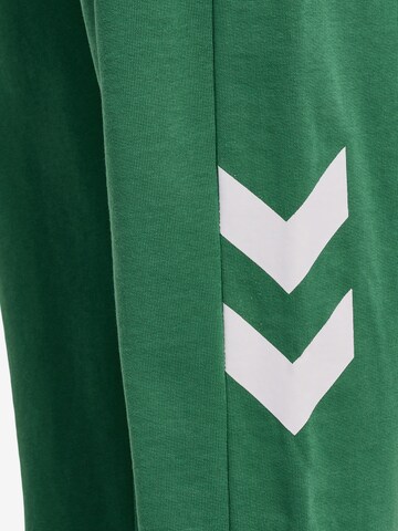 Hummel - Tapered Pantalón deportivo en verde