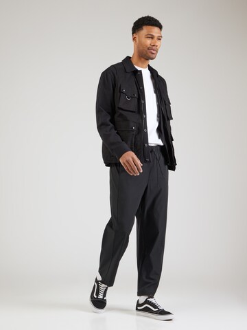 Loosefit Pantalon Champion Authentic Athletic Apparel en noir