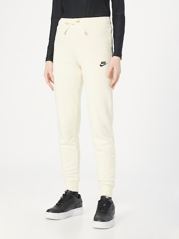 Nike Sportswear Tapered Trousers in White: front