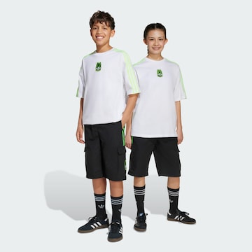 ADIDAS ORIGINALS Loose fit Trousers 'Adidas Originals X Minecraft' in Black: front