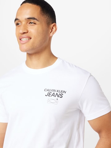 Calvin Klein Jeans T-Shirt in Weiß | ABOUT YOU