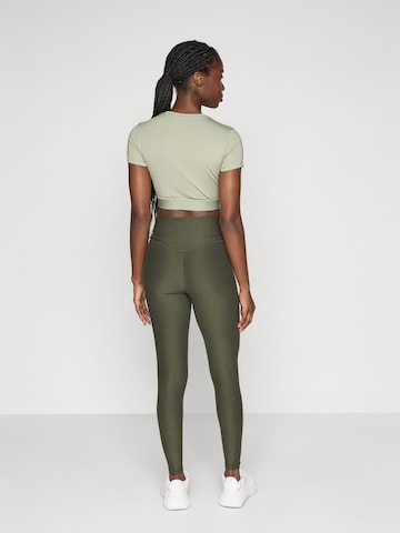 žalia PUMA Siauras Sportinės kelnės 'CLOUDSPUN'