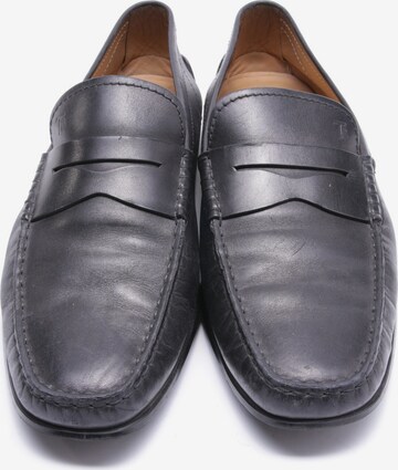 Tod's Flats & Loafers in 42 in Black