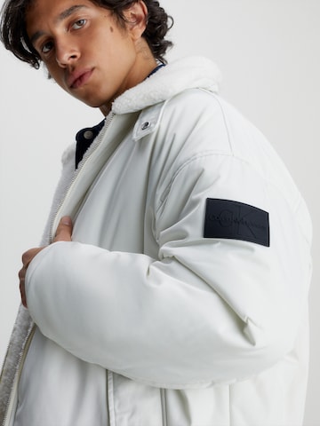 Calvin Klein Jeans Prehodna jakna | bela barva
