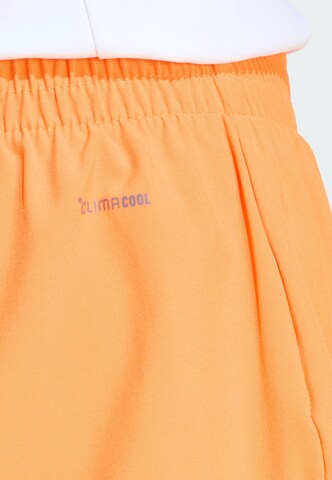 ADIDAS PERFORMANCE - regular Pantalón deportivo en naranja