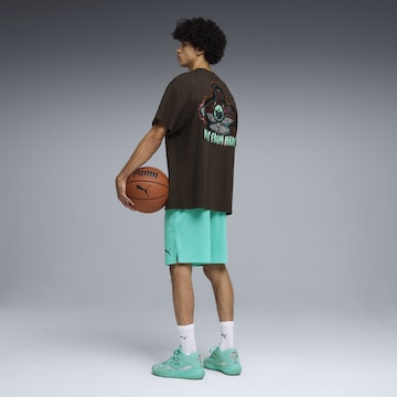 PUMA Performance shirt 'Melo World' in Brown