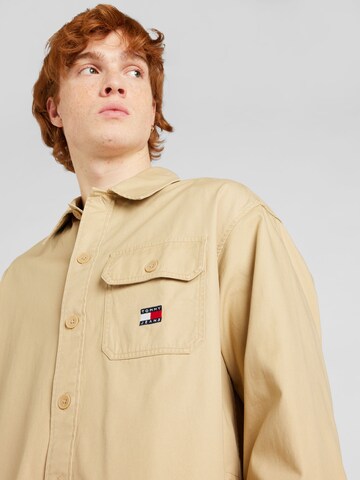 Tommy Jeans Tussenjas 'VARSITY HERO' in Beige