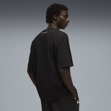 PUMA T-Shirt 'Puma x Porsche Legacy' in Schwarz