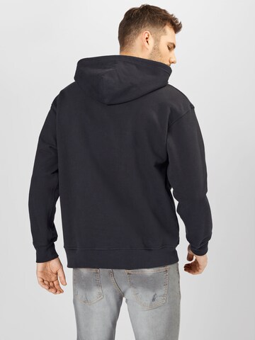 LEVI'S ® Средняя посадка Свитшот 'Relaxed Graphic Hoodie' в Черный
