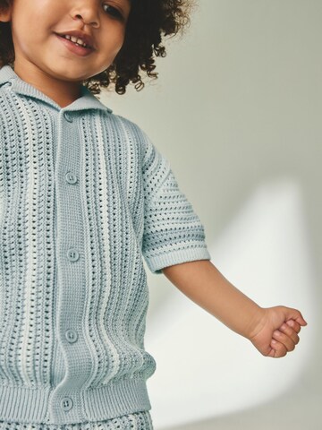 Set Next en bleu