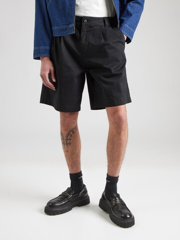Loosefit Pantaloni con pieghe di HOLLISTER in nero: frontale