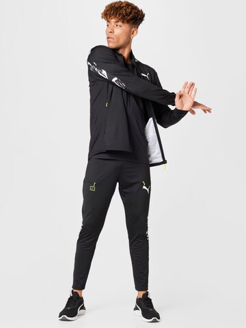 Effilé Pantalon de sport PUMA en noir