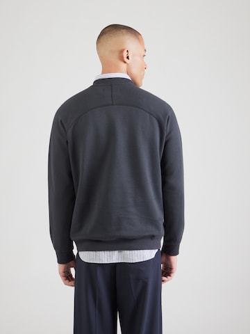 Bluză de molton de la Lyle & Scott pe albastru: spate