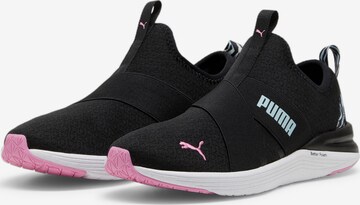 Baskets basses PUMA en noir : devant