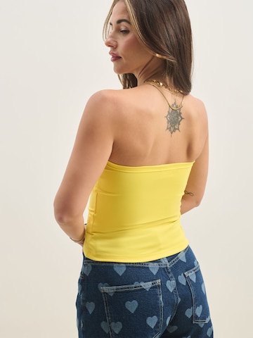 Top di Sálea in giallo