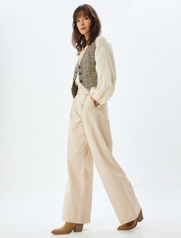 Koton Loose fit Pleat-front trousers in Beige