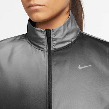 NIKE Sportjacke in Grau