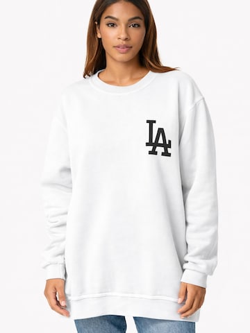 Worldclassca Oversized Sweater in White: front