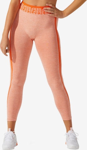 ASICS Skinny Leggings 'Asics W Cropped Logo Seamless Tight' in Oranje: voorkant