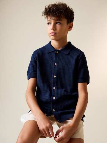 Next Плетена жилетка в синьо: отпред