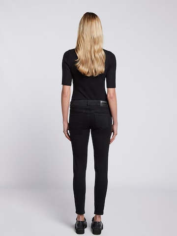 Goldgarn Skinny Jeans in Schwarz