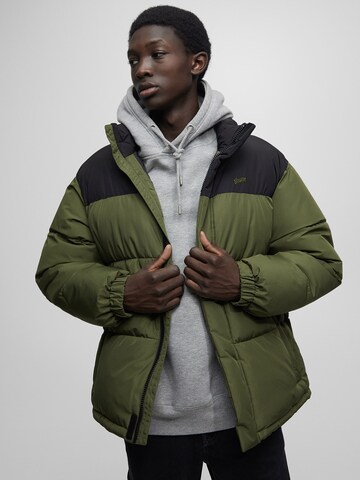 Pull&Bear Winter jacket in Green: front