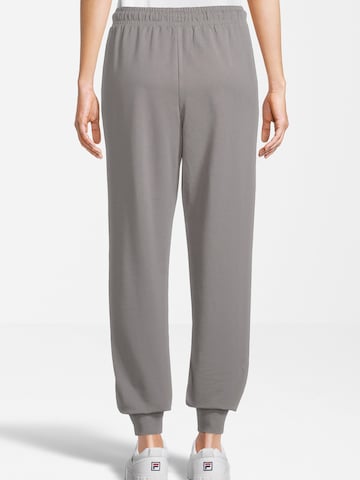 FILA Tapered Urheiluhousut värissä lila