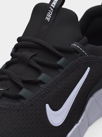 Chaussure de sport 'Free Ride' NIKE en noir