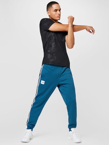 UNDER ARMOUR Regularen Športne hlače | modra barva