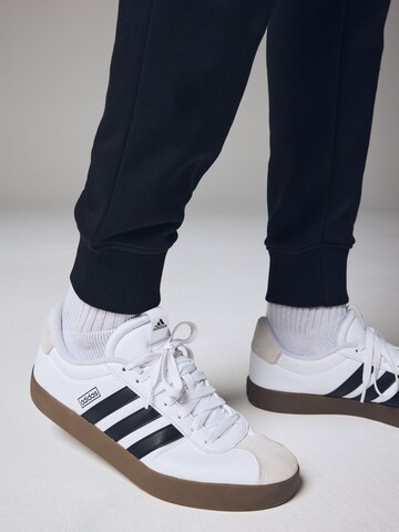 Tapered Pantaloni di Next in nero