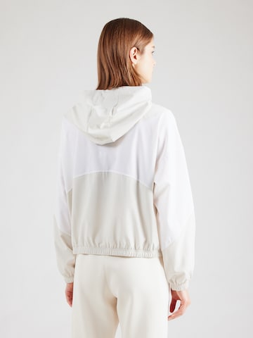 Veste de sport 'Rival' UNDER ARMOUR en blanc