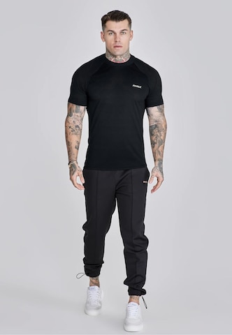 SikSilk - Camiseta 'Tech' en negro: frente